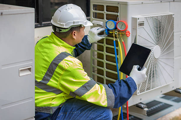 Professional Heat Pump Repair technician working in Central City, KY